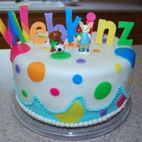 Webkinz Birthday Cake Webkinz cake with bright colored polka-dots, done in MMF.