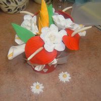 Gumpaste Flower Bouquet my first try at making gumpaste flowers at home.....was motivated to teach myself before signing up for the wilton course. it took a lot of...