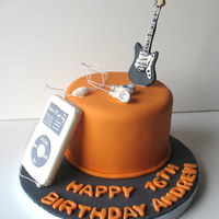 Musician Birthday Birthday cake for a musical teenager. ipod and guitar are made of gumpaste