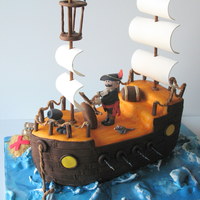 Pirate Ship Pirate ship carved cake. Covered in fondant with gumpaste sails and accents. Borrowed lots of ideas from CC members. Loved the idea of...