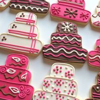 Pink & Brown Wedding Cake Cookies Wedding cake-shaped sugar cookies for a pink, brown and ivory wedding. All decorated with royal icing in unique designs