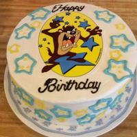 Taz Birthday Cake Rd velvet 8" layer cake with an edible icing image and BC piping