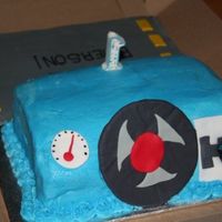 Car Birthday Cake I made this cake for a one year old boy's birthday. The gramma requested a steering wheel cake because the child loved steering wheels...