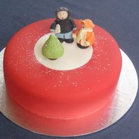 Carol Singers Christmas fruit cake covered on Fondant with fondant figures.