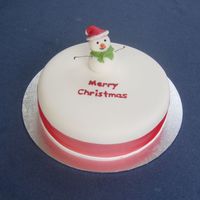 Snowman Christmas Fruit cake covered with Fondant and Fondant snowman. Royal icing writing. A really nice easy way to decorate a Christmas cake...