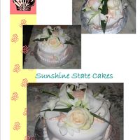 Pretty Shells And Flowers This cake was made for a small wedding. Sugar Shells made in a chocolate mold and then taken out, dried, airbrushed with ornage pink and...
