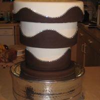 Up-Side-Down Cake This cake was cool.. we had a bride that wanted three cakes in different configurations. At the venue the planner added the topper, but she...