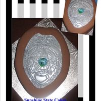 Officer Blount Is Another Year Older This was for my bosses niece. she is a cop for the MDPD. cake was vanilla with buttercreme, and the outside is chocolate fondant with...