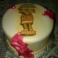 Tumi Cake this cake has a peruvian god gracing the top with drapping in red to look like the peruvian flag... tumi cake