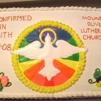 Confirmation Cake This is the first cake I made for money. It is a 1/2 sheet cake torted and filled with strawberry filling. The center dove medallion is...