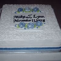 30Th Anniversary It was their 'pearl' anniversary. Inside is WASC cake with vanilla buttercream. Pearl accents.