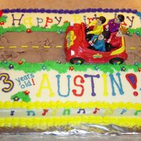 The Wiggles Decorated with buttercream. Car and figures were toys for the birthday boy.
