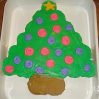 Chistmas Tree Cupcake Cake Set up cupcakes to look like a tree, ice top all but bottom two green, ice bottom two brown, pipe star on top cupcake, and then add random...