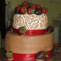 Chocolate Strawberry Cake This was my first stab at cornelli lace. I frosted two chocolate cakes with buttercream frosting then topped it with chocolate dipped...