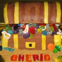Pirate Treasure Chest For a 3 year old's pirate theme birthday party, I made this treasure chest cake out of a 12x18 layer cut in half then stacked. Frosted...