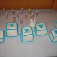 Baby Blocks I made these blocks for my sister's baby shower. I made two 12x18 chocolate layers and stacked them. Then cut them into 4"x4&quot...