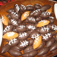 Football Cake Balls I used the same cake ball recipe that we all use for Christmas, but shaped them into footballs and used store bought icing to draw on laces...