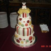 Teddy Bear 10, 8,6,4 all fondant with fondant bear topper. Made to coordinate with nursery bedding. The stripes were much harder than I had...