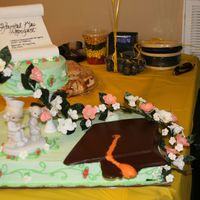 Nursing School Graduate A friend and I put together this cake for her sister. All flowers are r.i., which we made into the garland and used as decorations on the...