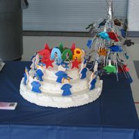 Kindergarten Graduation Cake I made for DD's Kindergarten graduation. The stars, graduates, and numbers are made from fondant. I got the idea from doing a...