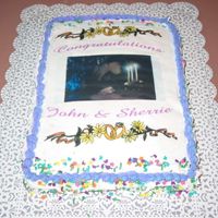 Inlaw's Engagement Cake I made this cake using an inkjet printer with an edible frostingsheet. Everyone loved it.