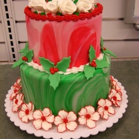 Red And Green Magic I made this as a display for the store I work at. Marbelized the fondant, royal icing petunias (without the stamens) and roses on the top