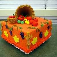 Fall Festival This is a display for the store I work at. The fruits and vegetables are all gum paste, the cornucopia is made with royal icing over a snow...