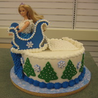 Winter Barbie This is a cake I made for display at the store I work at.....the sleigh is gum paste cut with a copper cookie cutter, trees are Wilton tree...