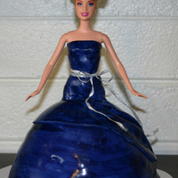 Bridesmaid Doll This was a complement to the bride cake I also did. Bridesmaid's dress followed their exact dresses. White fondant painted with navy...