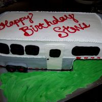 Trailer.jpg Made out of 2 11x15's cut in half and stacked. Covered in buttercream with MMF accents.