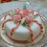 Birthday Cake is vanilla with gumpaste carnations