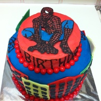 Spiderman Chocolate Spiderman, buttercream icing, MMF buildings, Jaffa decorations