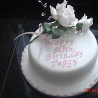 80Th Birthday Cake This was made for a collegue's mum's 80th birthday. My mum made the rose but i did the lettering!