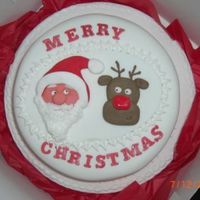 Christmas Cake plaque was made during night school but collegue liked it so much i put it on a cake for her. Father Christmas looks as though he has had...