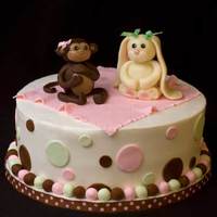 Monkey Baby Shower Cake Buttercream with fondant accents. Monkey and Bunny are made out of modeling chocolate.
