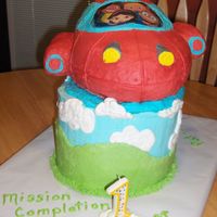 Rowan's Rocket Birthday cake based on little einsteins, Rocket, for grandson's 1st birthday. Everything is edible except the laminated character...