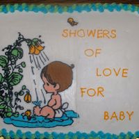 Precious Moments Baby Shower Precious moments picture taken from childs sticker book and done as a Buttercream transfer onto a sheet cake.