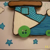 Train Baby Shower Cupcake Cake made out of 24 cupcakes. this was to match invitation napkins all made out of buttercream except for the fondant button wheels