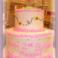 Winnie The Pooh all white cake with bc. mom made the winnie the pooh for the cake