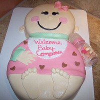 Baby Girl Cake This was a cake based on a picture a friend showed me. It was very cartoonish, but very cute. She loved it.