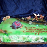 Sportsman Cake White cake with Strawberry Filling. Done for a boy that loves to hunt, fish, and four wheel! He didn't want to cut the cake, so I...