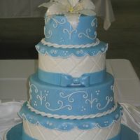 Blue Cake My cake for the Great American Cake Show 2009. 6-8-10-12 inch styrofoam dummies covered in rolled fondant. Piping was done in royal icing...