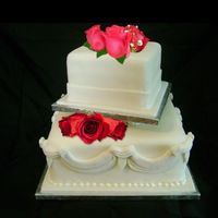 The Wedding That Wasn't. This is the cake for the wedding that was cancelled. Off set 10" and 6" squares. with 1.5" seperation. Roses are...