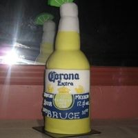 Happy Birthday Bruce! Corona bottle for a friends 31st b-day. 6" rounds stacked and carved with RCT "neck" and gumpaste lime. Covered in fondant...