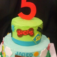 Super Mario/scooby Doo Cake This was a cake for twins for their 5th birthday, one wanted Mario Bros. while the other wanted Scooby Doo so they got both!