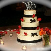 Wedding Cake This was the wedding cake I made for my brother. All BC with scrolls on sides. Dk Brown ribbon. For something different, I did the 2nd and...