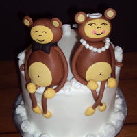 Monkey Lovers Anniversary Buttercream icing. Monkey 50/50. Veil, necklace and bow gumpaste.