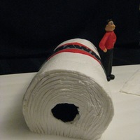 Brawny Paper Towel 7 six inch rounds marble cake, buttercream with fondant logo. Brawny man is made of fondant. Extra towel is fondant then I covered it in...