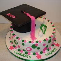 College Graduation A request from a Cleveland State University graduate. It's a 12" chocolate cake iced in buttercream with fondant accents. The cap...