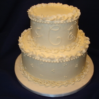 Ivory Wedding Cake My first wedding cake for a second wedding. Both 6" and 9" tiers were vanilla cake (Magnolia Bakery vanilla cake) with vanilla...